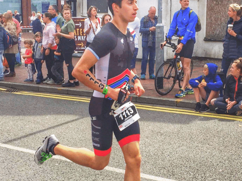 James Tugwell competing in a triathlon run leg