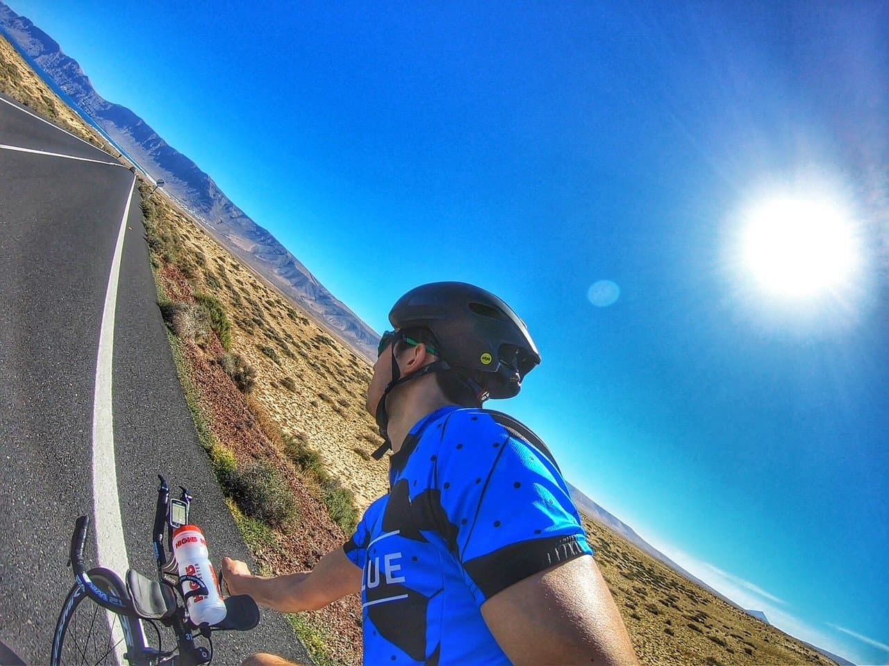 James Tugwell road cycling in mountainous terrain